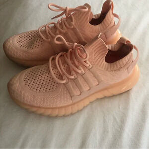 Baby pink running shoes​